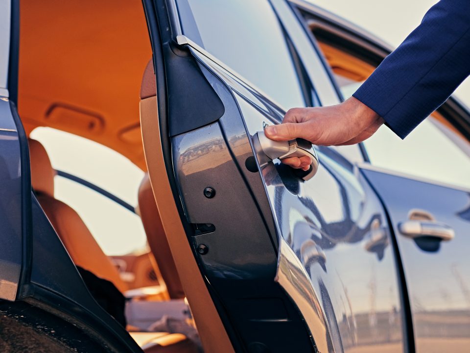 Close,Up,Image,Of,A,Man,Opens,Car's,Door.