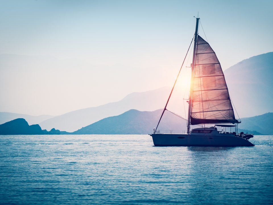 Sailboat,In,The,Sea,In,The,Evening,Sunlight,Over,Beautiful